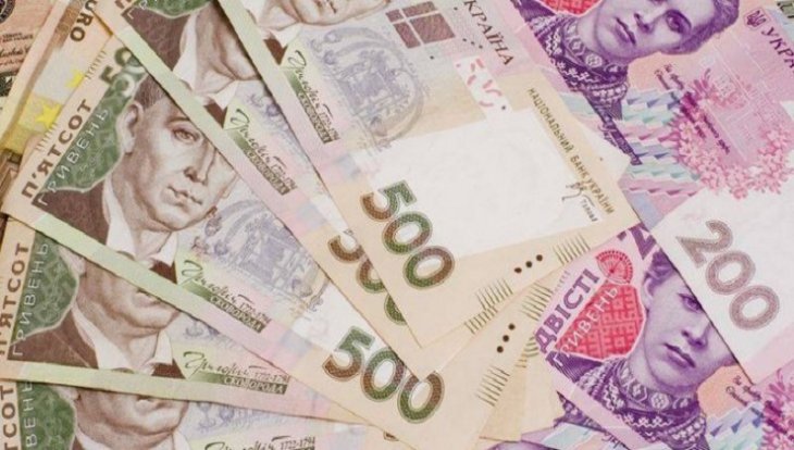 Нацбанк послабив курс гривні на 21 копійку